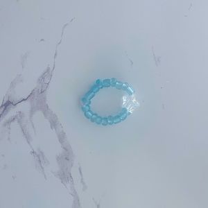 Super cute teal and glass beaded star ring.